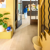 White Varnished Oak IM3105 Impressive 8mm Laminate Flooring by Quick-Step