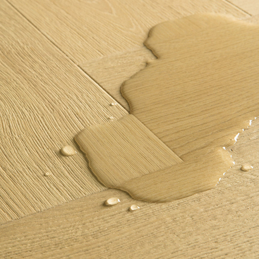 Nutmeg Oak IMD8243 Impressive Design 8mm Herringbone Laminate Flooring by Quick-Step