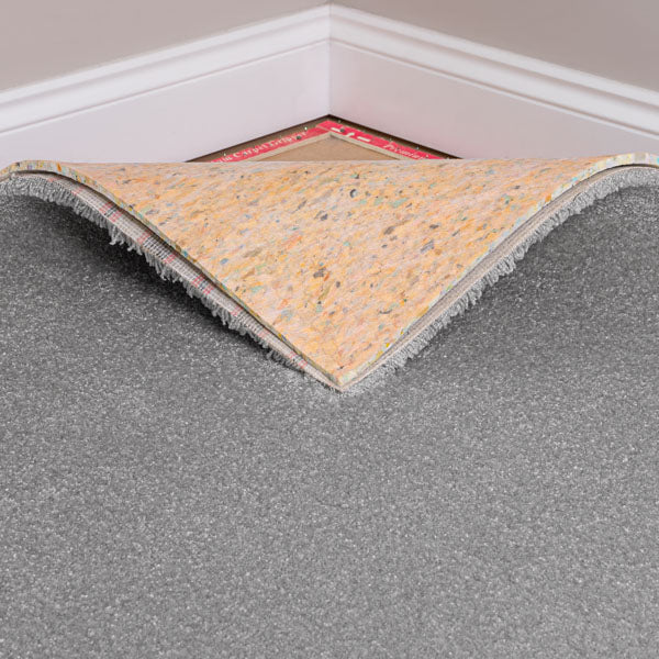 https://www.onlinecarpets.co.uk/cdn/shop/products/high-density-9mm-thick-carpet-underlay-lifestyle_grande.jpg?v=1680100294